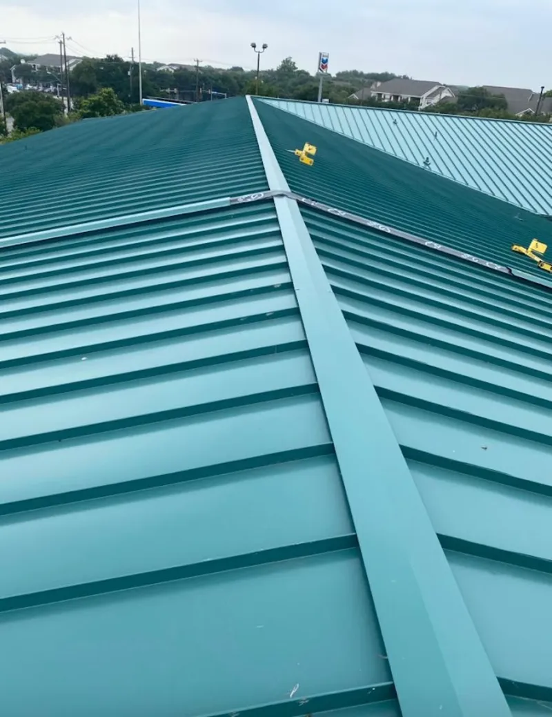 Green commercial metal roof ridge and valley for Metal Roof Repair in Roseland