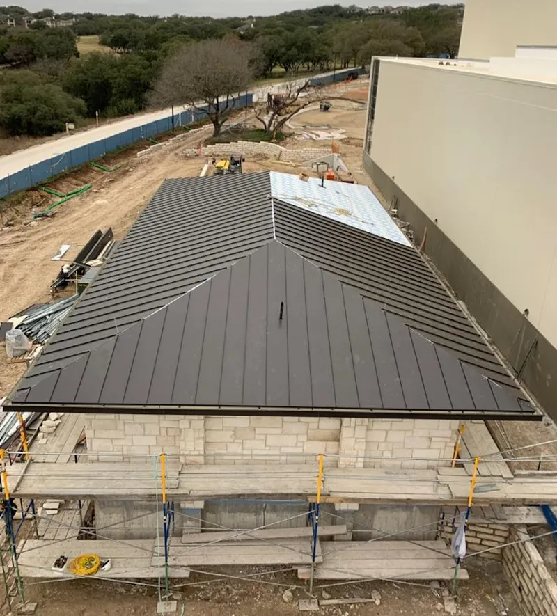 Metal roof new construction with scaffolding in Roseland